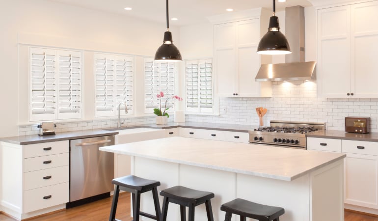 Plantation shutters in a bright Bluff City kitchen.